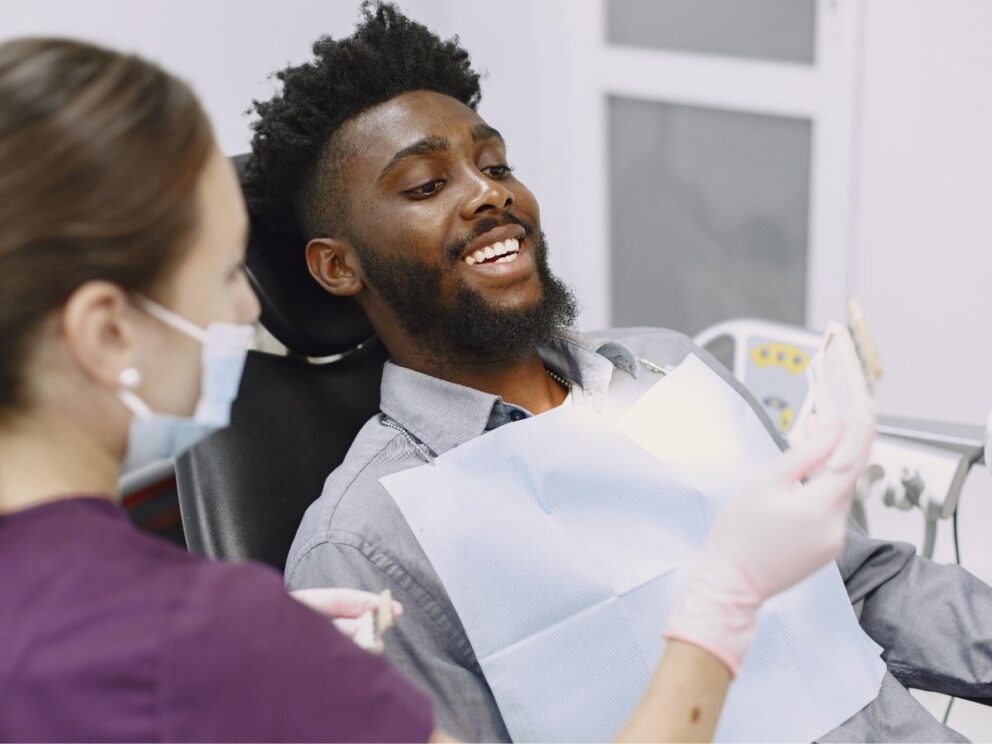 Patient at Gramercy Park Dental looking at veneer options